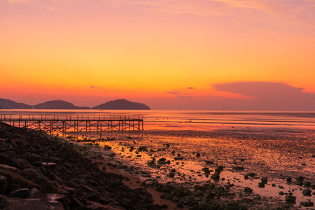 Scene of wooden bridge and beautiful twilight sky at Saphanhin, Phuket, Thailand.の写真素材