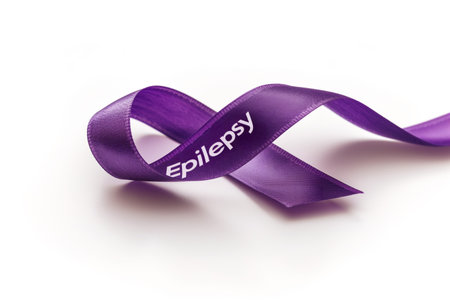 A purple ribbon with the word 'Epilepsy' represents support and awareness for epilepsy, against a white background. Generative AI.の素材