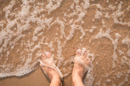 foot on the beachの写真素材