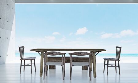 The inteior design of loft dining room and dining table and concrete wall background texture and sea...