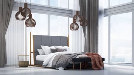 Modern tropical interior design of double space bedroom and concrete wall and sea view backgroundの写真素材