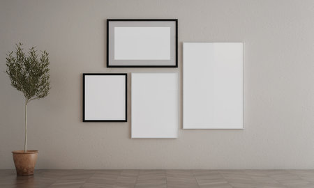 Three blank picture frames on a white wall. 3d rendering mock upの写真素材