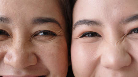 Portrait close up attractive beautiful two asian people half face cheek smile to camera authentic...