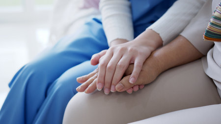 Close up hand of young asia woman or nurse home care holding senior grandmother give support empathy...