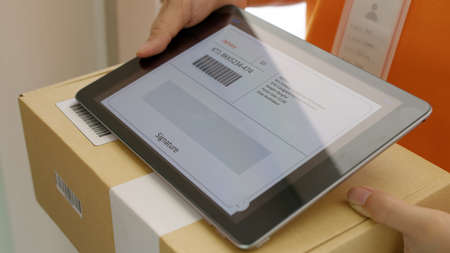 Close-up hand asia people girl send receive pickup express postal post mail from retail order online...