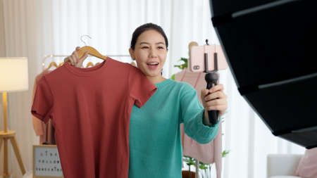 Asia blogger woman influence, SME retail store owner smile enjoy selling show live sale online...