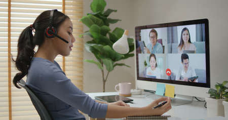 Happy smile asia young woman learn mba college class on wifi webcam video call in desktop pc screen...