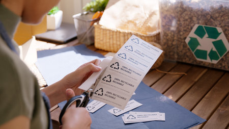 Eco vendor go green packaging parcel carton box in net zero waste store asian seller retail shop. Earth care day small SME owner asia people wrap reuse brown paper pack gift reduce plastic free order.の写真素材