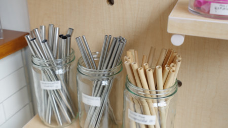Biodegradable vegan shop for buying eco bio goods glass jar pack on shelf. Trendy living life in SME startup store go green market refill bulk shop for reduce climate change net zero free concept.の写真素材