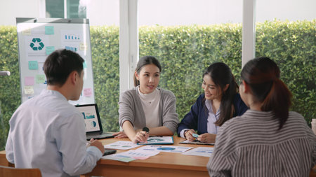 Carbon offset price report CO2 emission. Future growth Net zero waste in ESG ethical SME office protect climate change global warming social issues project. Group of asia people Eco friendly SDGs planの写真素材