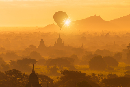 Beautiful silhouette landscape view of sunrise morning in Bagan, an ancient city located in the Mandalay Region of Myanmar.の写真素材