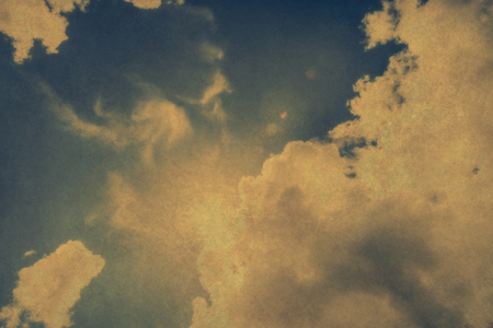 Vintage background of blue cloudy sky.の写真素材