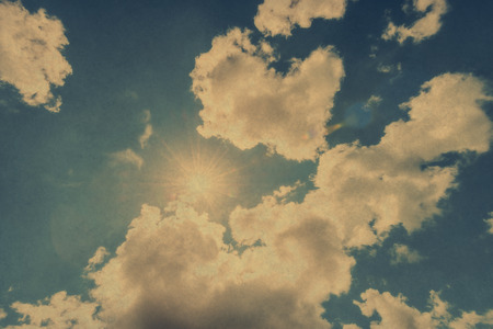Vintage background of blue cloudy sky.の写真素材