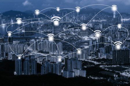 Wifi network connection concept on blue tone Hong Kong cityscape background and network connection concept - Network business conection systemの写真素材