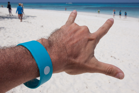 Close-up my hands  on the beachの写真素材