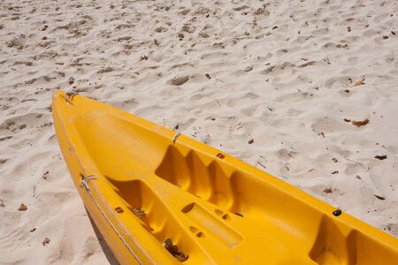 Yellow kayak on the beach.の写真素材