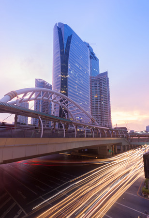 View of high buildings and public sky walk for transit between Sky Transit and Bus Rapid Transit Systems at Sathorn-Narathiwas junctionのeditorial素材