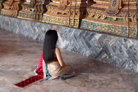 Beautiful woman in traditional dress costume,Asian woman wearing typical 
Thai dress identity culture of Thailand.の写真素材