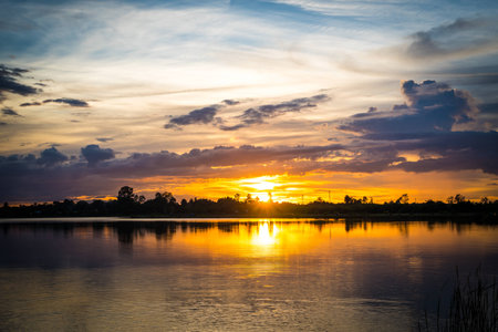 sky at sunset on the lakeの写真素材