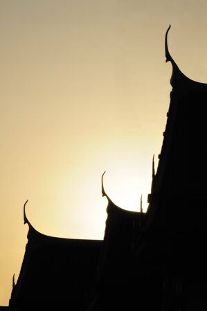 Silhouette of Thai temple's roof.の写真素材