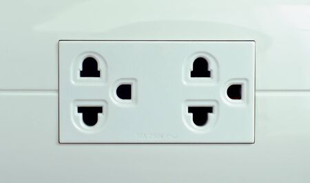 An electric plug socket as a background