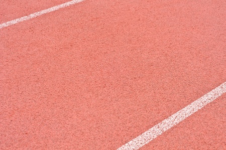 Red running track as a backgroundの写真素材