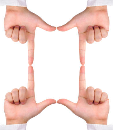 Four aiming hand signs created a frame for copy space isolated on white backgroundの写真素材