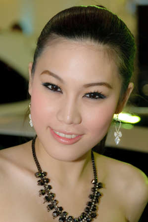 NONTABURI,THAILAND-MAY 21: Unidentified female presenter at the Super Car & Import Car Show on May 21,2011 in Nontaburi, Thailand.のeditorial素材