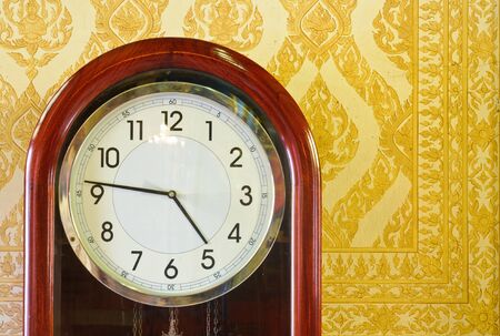 Antique clock in the Marble temple.の写真素材