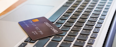 Banner image of credit card on computer keyboard. Online financial transaction for payment with technology and security concept.の写真素材