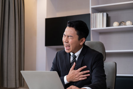 Adult men business person feeling painful from chest or heart attack while working, online meeting...