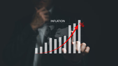 Business person point at infographic graph while analyze for interest and inflation rate that have potential growth and rising percentage with red arrow. Global economic and financial issue.の写真素材