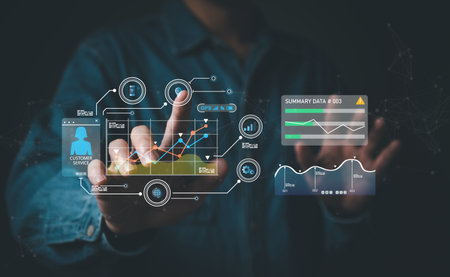young entrepreneur using big data analysis and cloud technology to collect customer data and display...