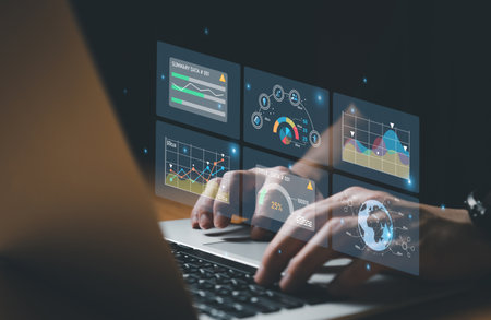 young entrepreneur using big data analysis and cloud technology to collect customer data and display on application dashboard from digital tablet to understand sale forecast and marketing plan.の写真素材