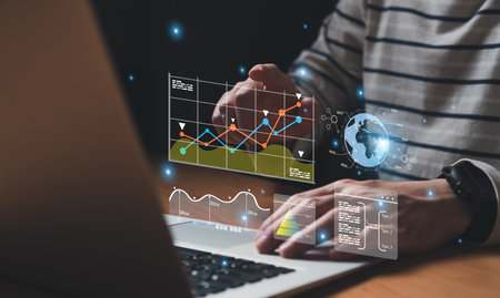 young entrepreneur using big data analysis and cloud technology to collect customer data and display on application dashboard from digital tablet to understand sale forecast and marketing plan.の写真素材