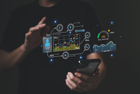 young entrepreneur using big data analysis and cloud technology to collect customer data and display...