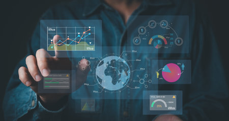 young entrepreneur using big data analysis and cloud technology to collect customer data and display on application dashboard from digital tablet to understand sale forecast and marketing planの写真素材