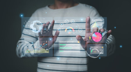 young entrepreneur using big data analysis and cloud technology to collect customer data and display on application dashboard from digital tablet to understand sale forecast and marketing plan.の写真素材