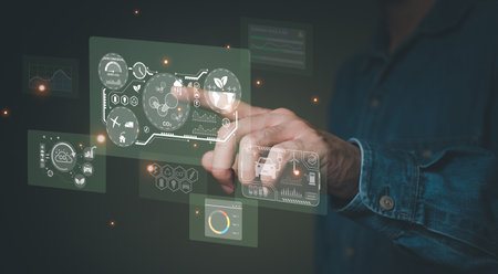 Entrepreneur hand point at digital screen dashboard while control and reduce carbon emission for global friendly business. Business with environment concern, carbon credit and zero emission.の写真素材