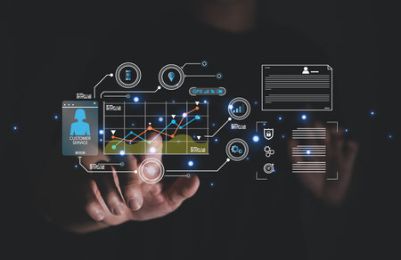 young entrepreneur using big data analysis and cloud technology to collect customer data and display on application dashboard from digital tablet to understand sale forecast and marketing plan.の写真素材