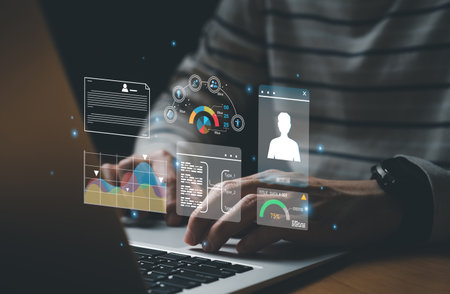 young entrepreneur using big data analysis and cloud technology to collect customer data and display on application dashboard from digital tablet to understand sale forecast and marketing plan.の写真素材