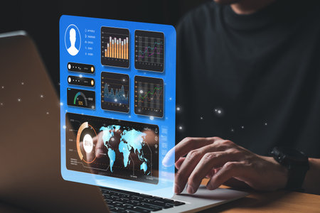 Young entrepreneur using big data analysis and cloud technology to collect customer data and display on application dashboard from digital tablet to understand sale forecast and marketing plan.の写真素材