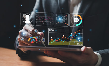 young entrepreneur using big data analysis and cloud technology to collect customer data and display on application dashboard from digital tablet to understand sale forecast and marketing plan.の写真素材