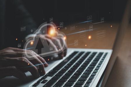 Business person migrate data and corporate information into cloud technology for data security and...
