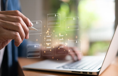 Entrepreneur using electronic devices for store customer data to gain customer insight in order to create marketing campaign that can help to increase sale and identify potential customer.の写真素材