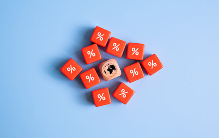 Cube with icon on background with worldwide percentage of interest and inflation rate that have potential growth and rising percentage with red arrow. Global economic and financial currency issueの写真素材