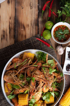 Spicy seafood bucket, Cook spicy shrimp mixed seafood Thai style, Thai foods.;の写真素材