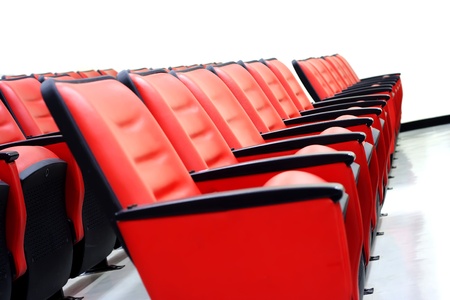 Red theater seats on the white room.の写真素材