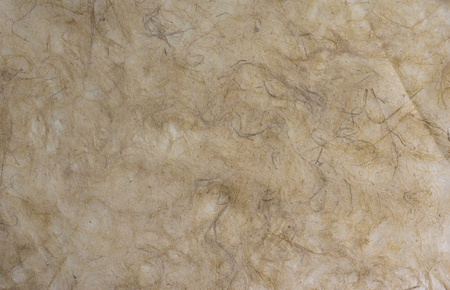 Soft brown mulberry paper with pulp background.の写真素材