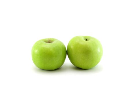 Double apples on white background の写真素材